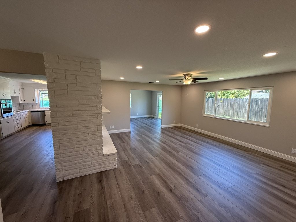 The renovated Woodworth Avenue great room looking through to the kitchen